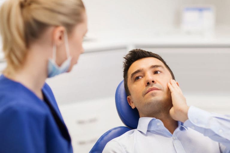 dental patient with tooth pain