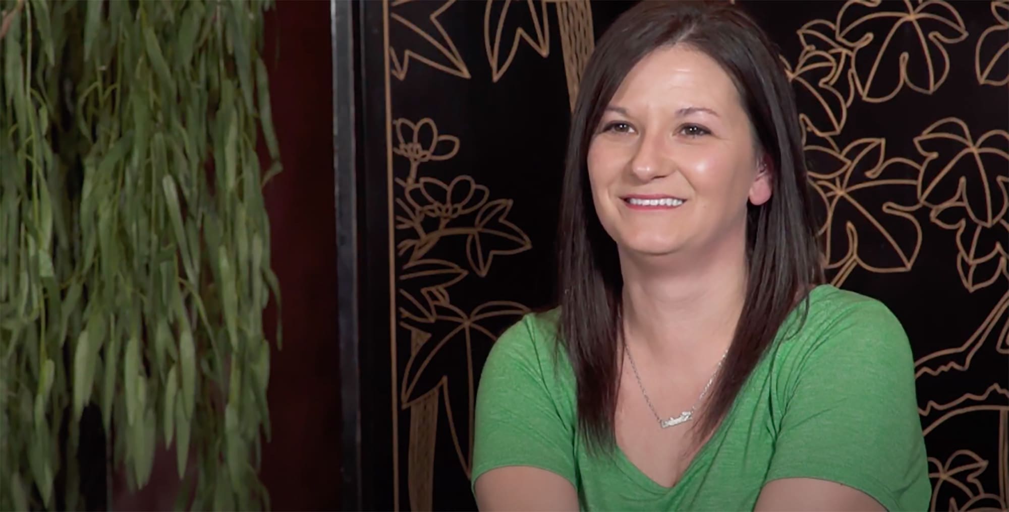 All-On-4 Dental Implant Patient Smiling, Showing Off Her Implants