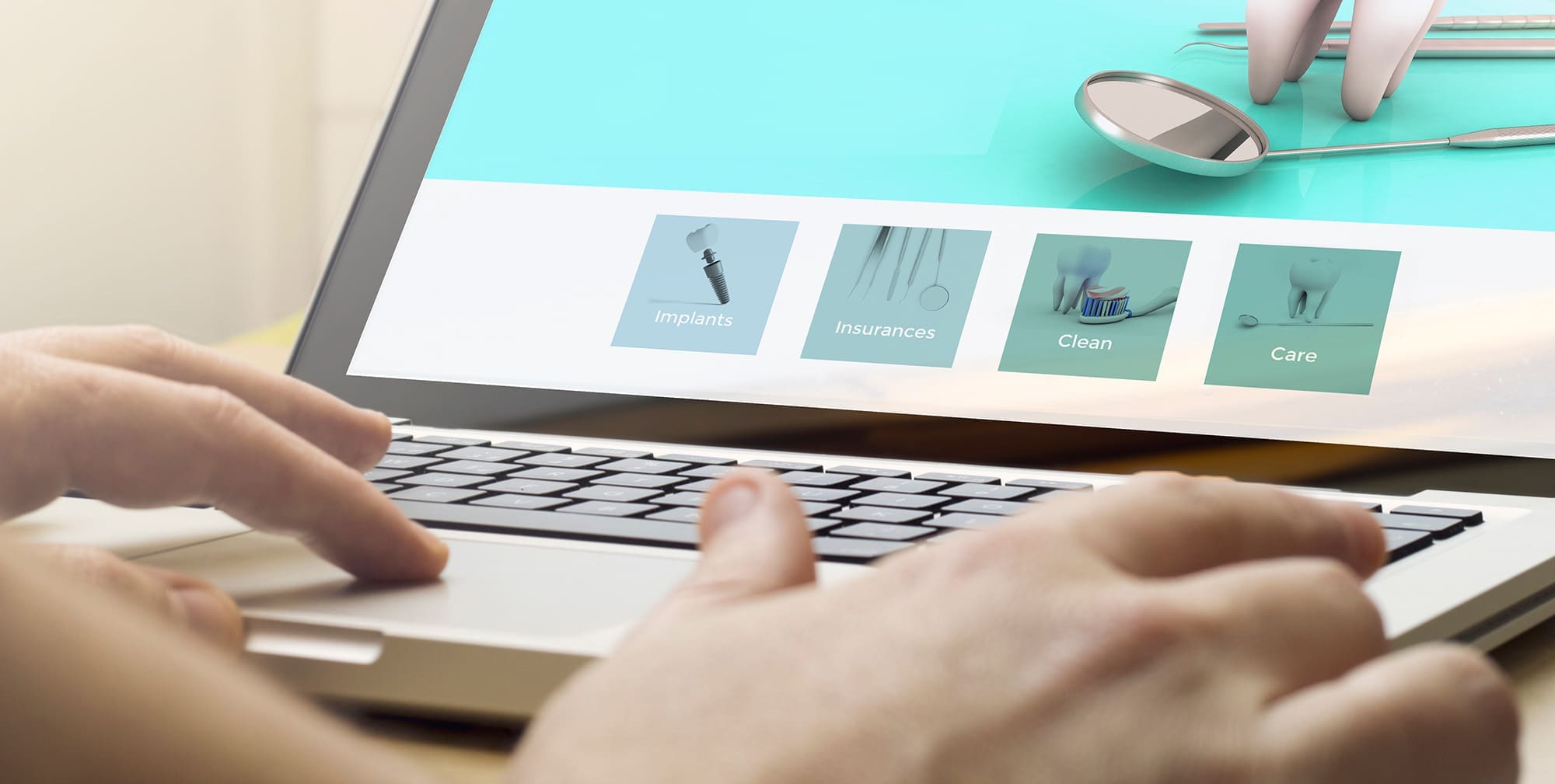 Man Using a Laptop With Dental Concept