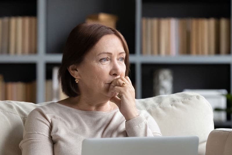 Dental Patient Wondering If She Should Get Dental Implants Or Dentures in Harrisonburg, VA