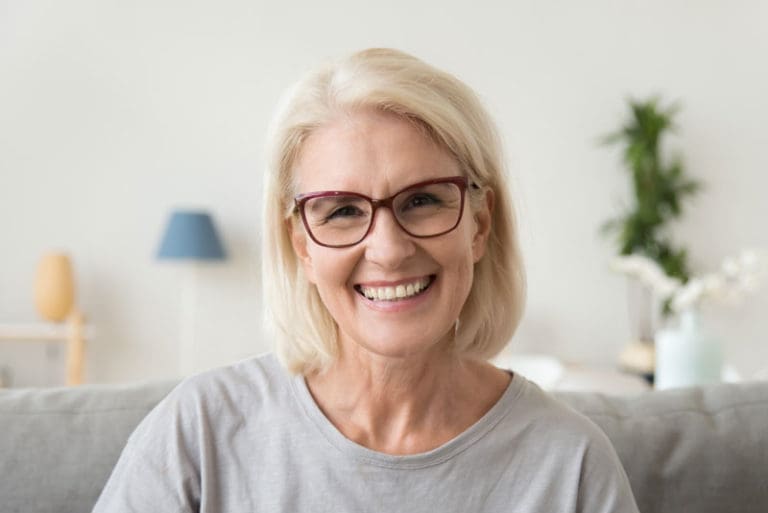 Dental Patient Smiling After Getting Dental Implants In Harrisonburg, VA